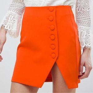 ASOS DESIGN side button mini skirt with split front